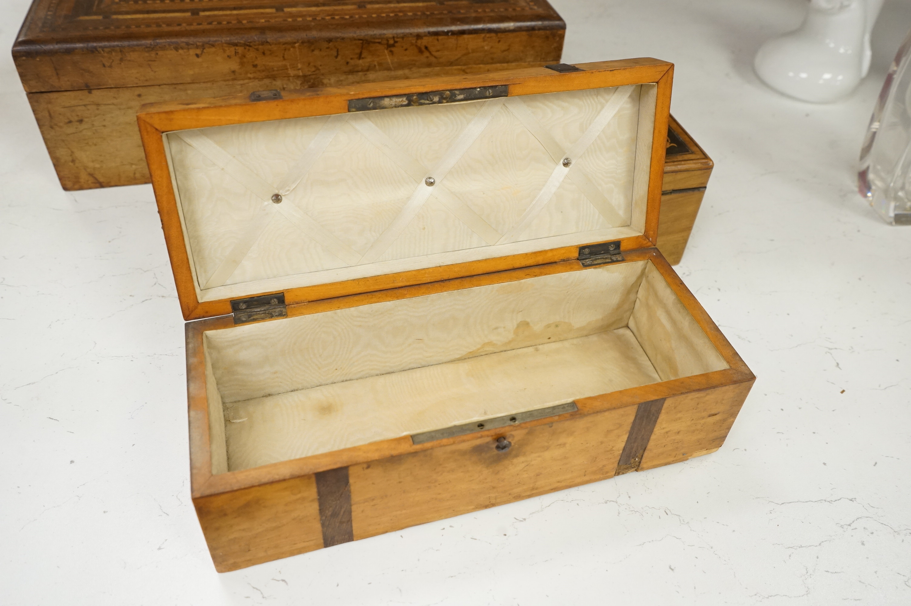 Three boxes comprising a Sorrento ware glove box, a marquetry inlaid slope and a rosewood dressing box, largest 39cm wide